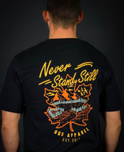 Load image into Gallery viewer, NEVER STAND STILL Oversized or regular fit tee
